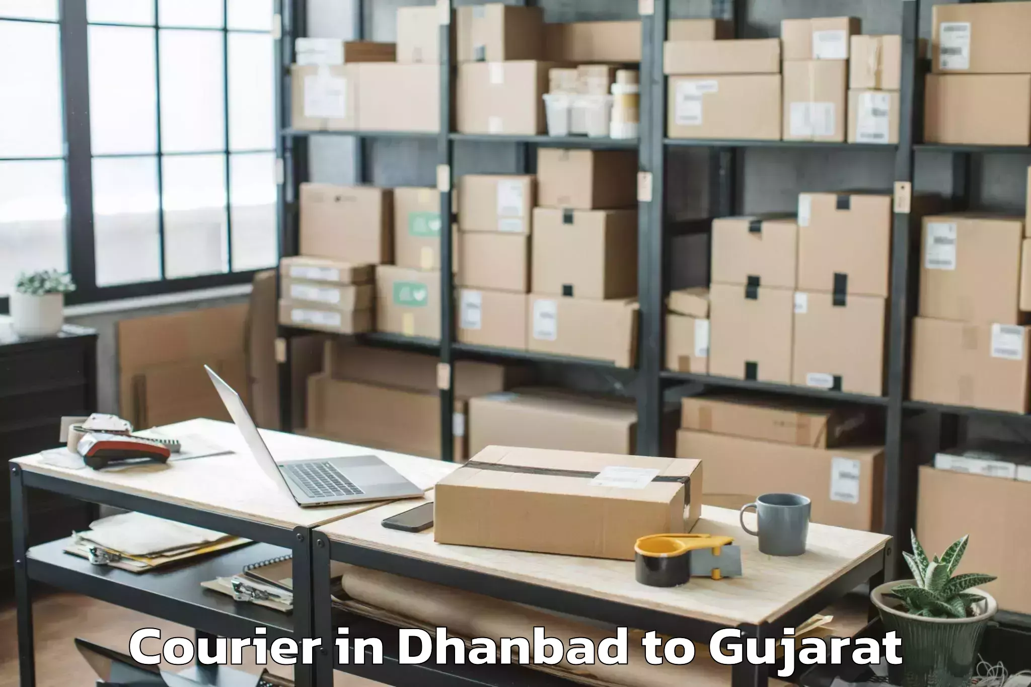 Book Your Dhanbad to Bagasra Courier Today